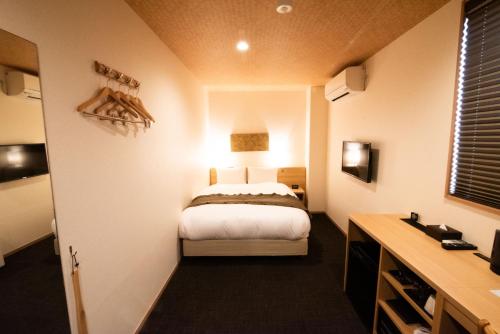 Postel nebo postele na pokoji v ubytování Excellent Hotel - Vacation STAY 52750v