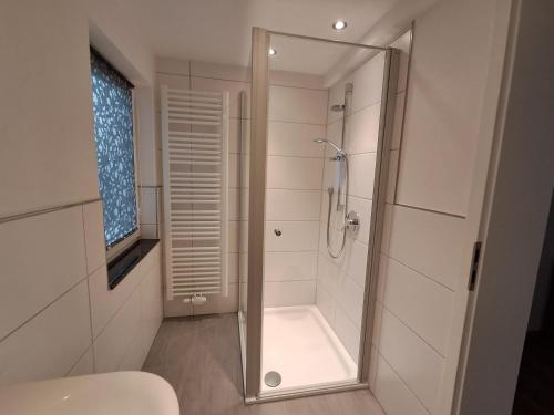 Bilik mandi di Ferienwohnung Löwensen
