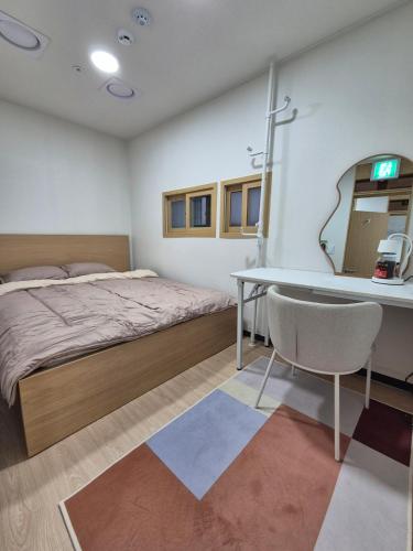 Ένα ή περισσότερα κρεβάτια σε δωμάτιο στο All Stay Hostel