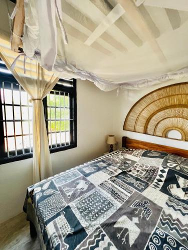 Ein Bett oder Betten in einem Zimmer der Unterkunft Banana Shamba Estate