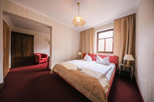 Postel nebo postele na pokoji v ubytování Hotel Zur Traube