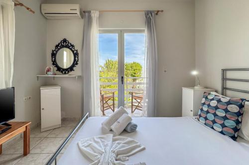 Ένα ή περισσότερα κρεβάτια σε δωμάτιο στο Alisahni Home 1