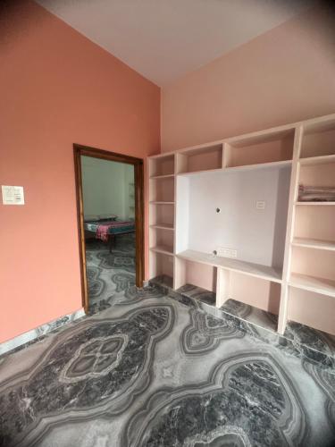 Postel nebo postele na pokoji v ubytování Tej Home Stays and Guest House