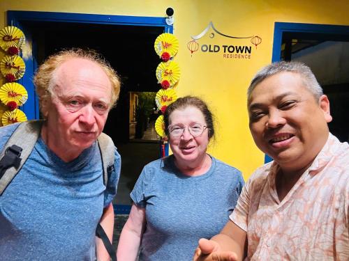 two men and a woman posing for a picture at Hoi An Old Town Residence - 56 Phan Boi Chau, Hoi An in Hoi An