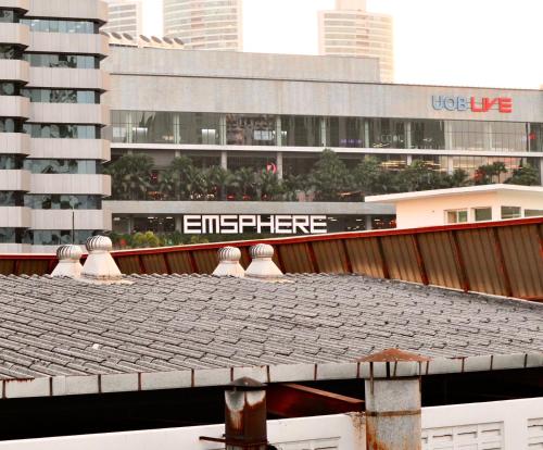 a roof of a building in front of a city at ICON NARINDRA SUITES HOTEL Sukhumvit Bangkok Thailand 50sqm to 90sqm Rooms & FREE Minibar in Bangkok
