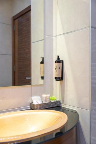Ein Badezimmer in der Unterkunft Hotel Bistrik City Center