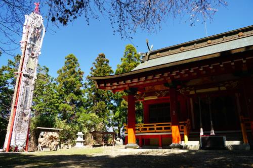 a building with a totem pole in front of it at La Union in Fukushima