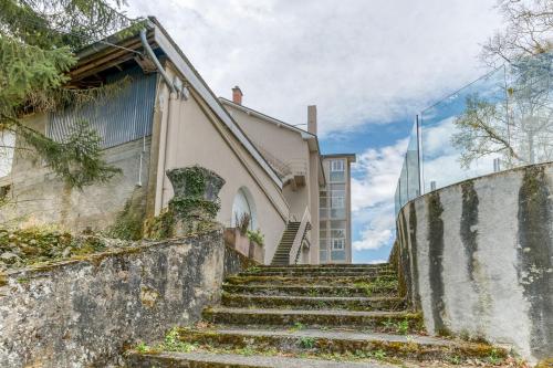 a set of stairs leading up to a building at Logis Belledonne in Arvillard