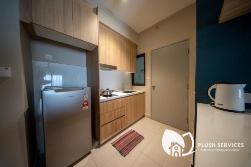 Maya Bay Residences at Gamuda Cove, Next to SplashManiaにあるキッチンまたは簡易キッチン