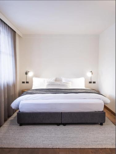 Postel nebo postele na pokoji v ubytování Hotel Bad Waldbrunn
