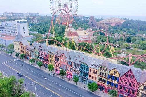 an aerial view of a amusement park with a roller coaster at Osen Hotel - Grand World Phu Quoc in Phu Quoc