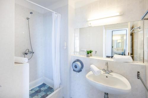 Koupelna v ubytování Hotel Hungária