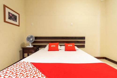 Un ou plusieurs lits dans un hébergement de l'établissement OYO Hotel L'Espace - Jaraguá Belo Horizonte
