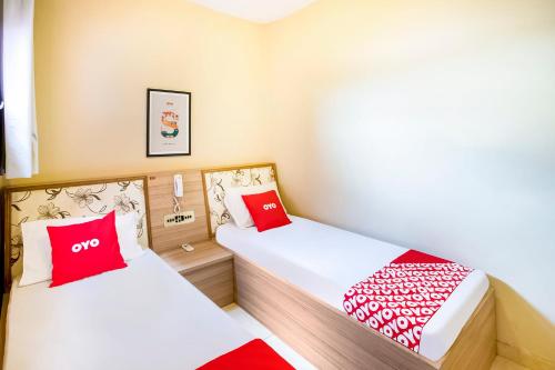 Cama o camas de una habitación en OYO Hotel Itarantim, São Paulo