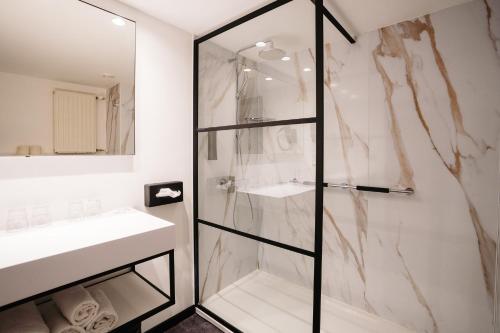 Koupelna v ubytování Ostend Hotel