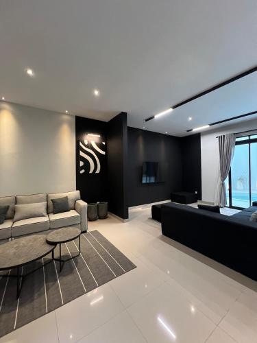 Et opholdsområde på Nossacasa Villa Sejuk Estetik Pool Setiabudi Bandung