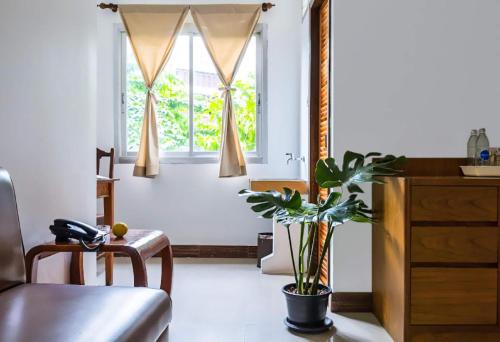 Zona de estar de Collection O Howard Square Boutique Hotel