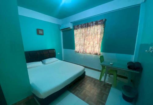 Ένα ή περισσότερα κρεβάτια σε δωμάτιο στο Hotel O Villa Thai