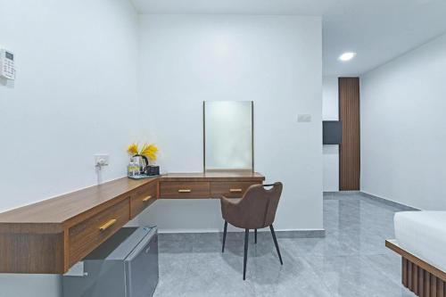 Una televisión o centro de entretenimiento en Padi Hotel Alor Setar