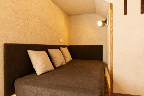 Una cama o camas en una habitación de Domus Mea Suites