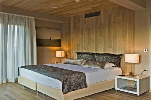 Postel nebo postele na pokoji v ubytování Ionian Villas Sivota