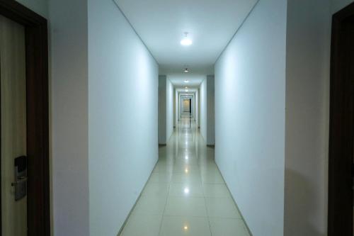Φωτογραφία από το άλμπουμ του Super OYO Townhouse OAK Hotel Fiducia Pondok Gede στην Τζακάρτα
