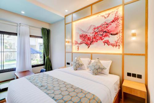 Postel nebo postele na pokoji v ubytování Collection O Samurai Hotel