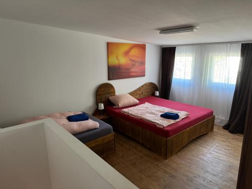 Postel nebo postele na pokoji v ubytování Heidelberg Apartments