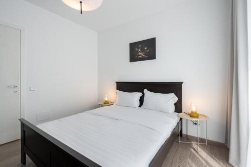 Postel nebo postele na pokoji v ubytování Class Residence Two - 2BR Suite