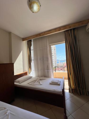 Postel nebo postele na pokoji v ubytování Hotel Veli