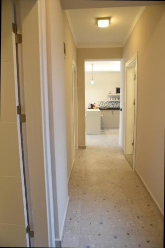 a hallway leading to a kitchen in a house at Mozaik Hotel in Oludeniz