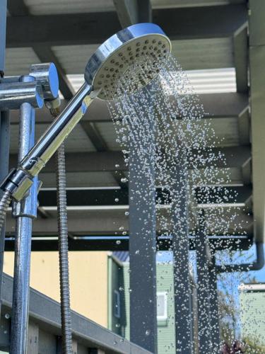 a water fountain that is shooting water into the air at SummerBreeze - just a 60 second stroll to the beach in Culburra Beach