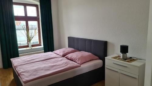 Katil atau katil-katil dalam bilik di FW 70 - kleine feine Wohnung mit Balkon