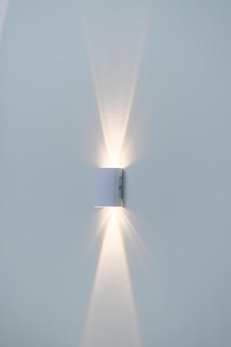 an open door with light coming out of it at Osen Hotel - Grand World Phu Quoc in Phu Quoc