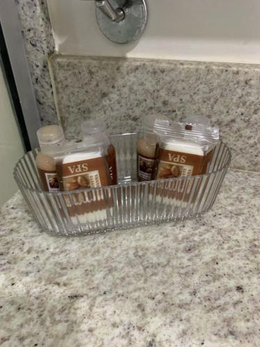 a container of food sitting on top of a counter at Apartamento Hotel Itaipava Petropolis in Petrópolis