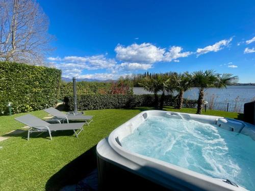 Foto Lake Home Holiday Wellness Villa da sogno sul lago