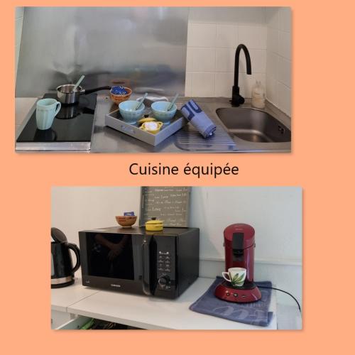 une cuisine avec un micro-ondes et un évier dans l'établissement Calme et arboré, Studio 34, à Digne-Les-Bains