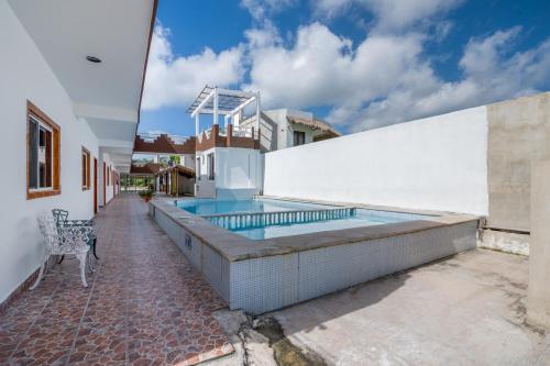 Bazén v ubytování OYO Hotel Palma Real nebo v jeho okolí