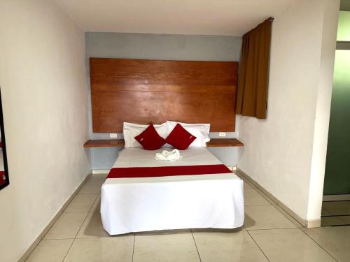 OYO Hotel Familiar Tollan Cholulaにあるベッド