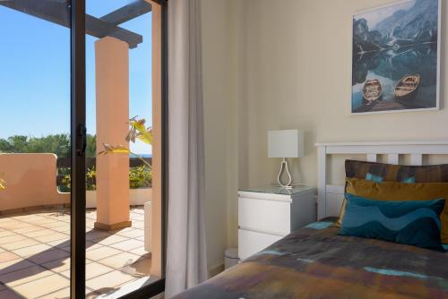 Ένα ή περισσότερα κρεβάτια σε δωμάτιο στο Casa Casares Beach