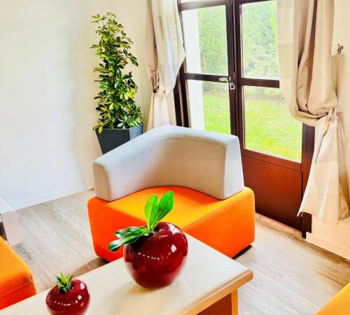 Χώρος καθιστικού στο Hotel Pavillon des Gatines