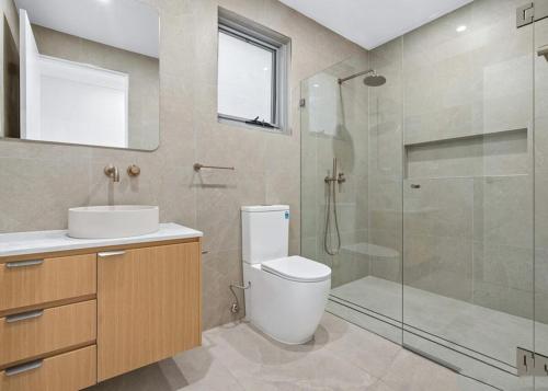Ένα μπάνιο στο Luxury Home in the Heart of Western Sydney