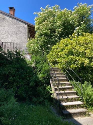 a set of stairs leading up to a building at Appartamento laForte - casaDELRESTO in Gaiola