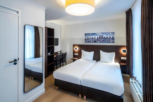 Postel nebo postele na pokoji v ubytování Hotel Nes Amsterdam