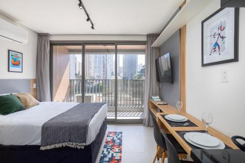 Ένα ή περισσότερα κρεβάτια σε δωμάτιο στο Edifício Lumen