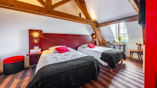 Hotel Relais De La Cote D'orにあるベッド