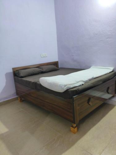 a bed in a room with a mattress on it at शिव शक्ति होमस्टे in Makoria Ām