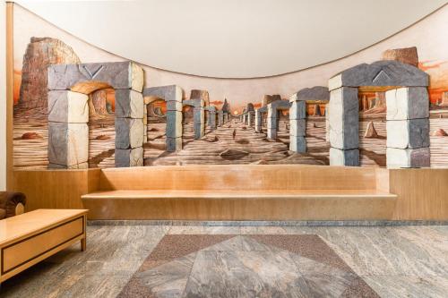a mural on the wall of a church at Capital O Andrade, Mexico City in Mexico City