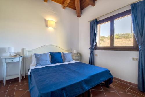 Ένα ή περισσότερα κρεβάτια σε δωμάτιο στο Villa Giada