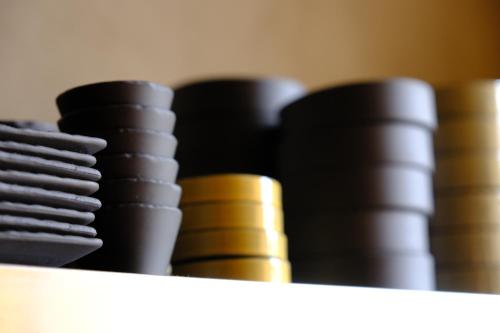 a group of different colored stackingools at Le Rêve d'Aghon Chambres et Restaurant in Bagnères-de-Bigorre